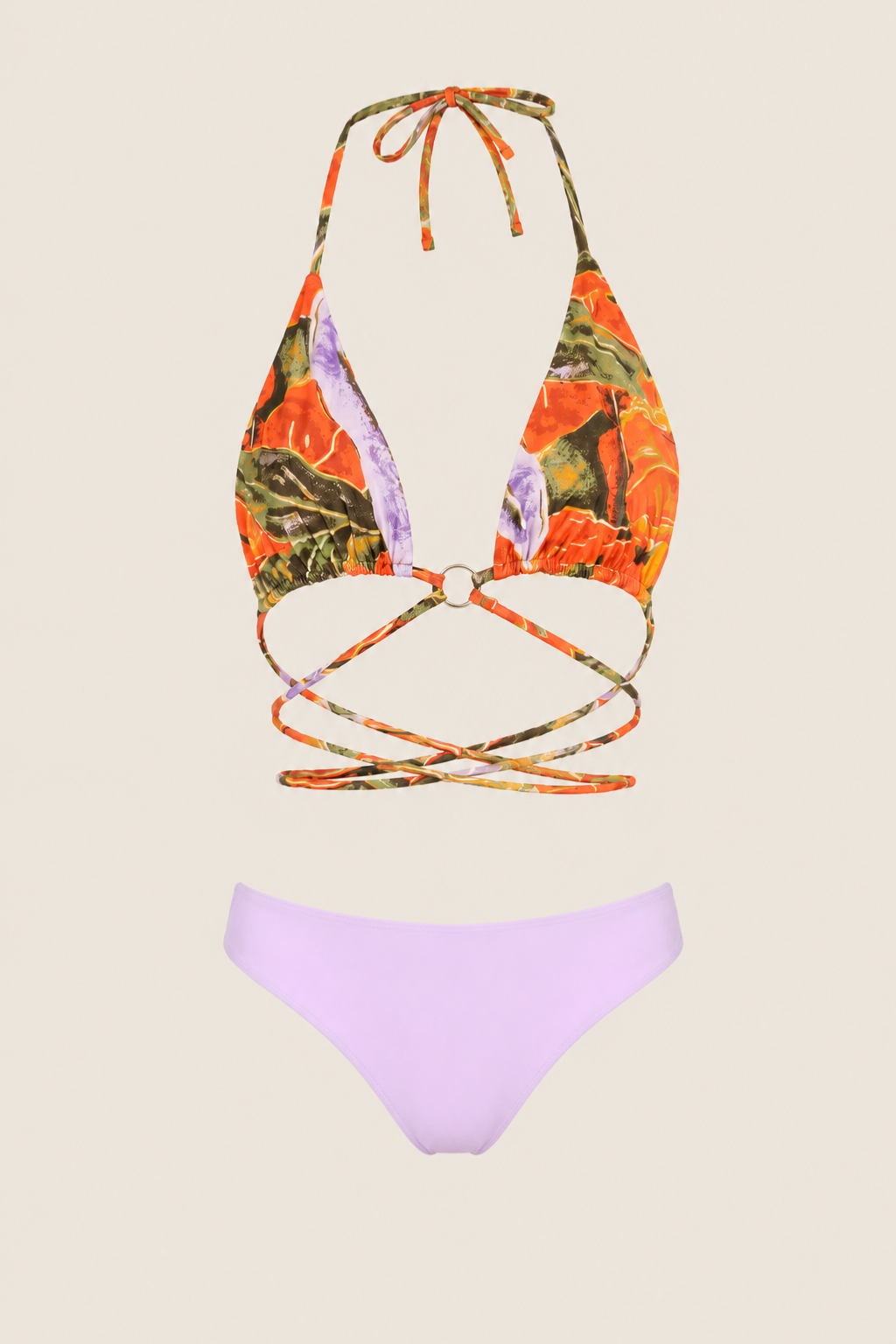 Bikini Indah Tamika completo sobre fondo blanco, top colorido con tirantes cruzados y braguita en tono lila sólido