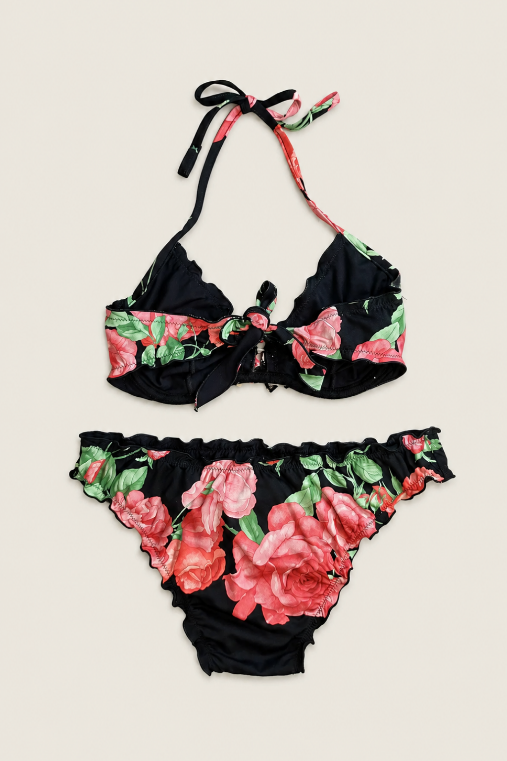 Bikini Raffaela D'Angelo Floral visto de espaldas, con tirantes ajustables y diseño que realza la figura femenina de manera natural