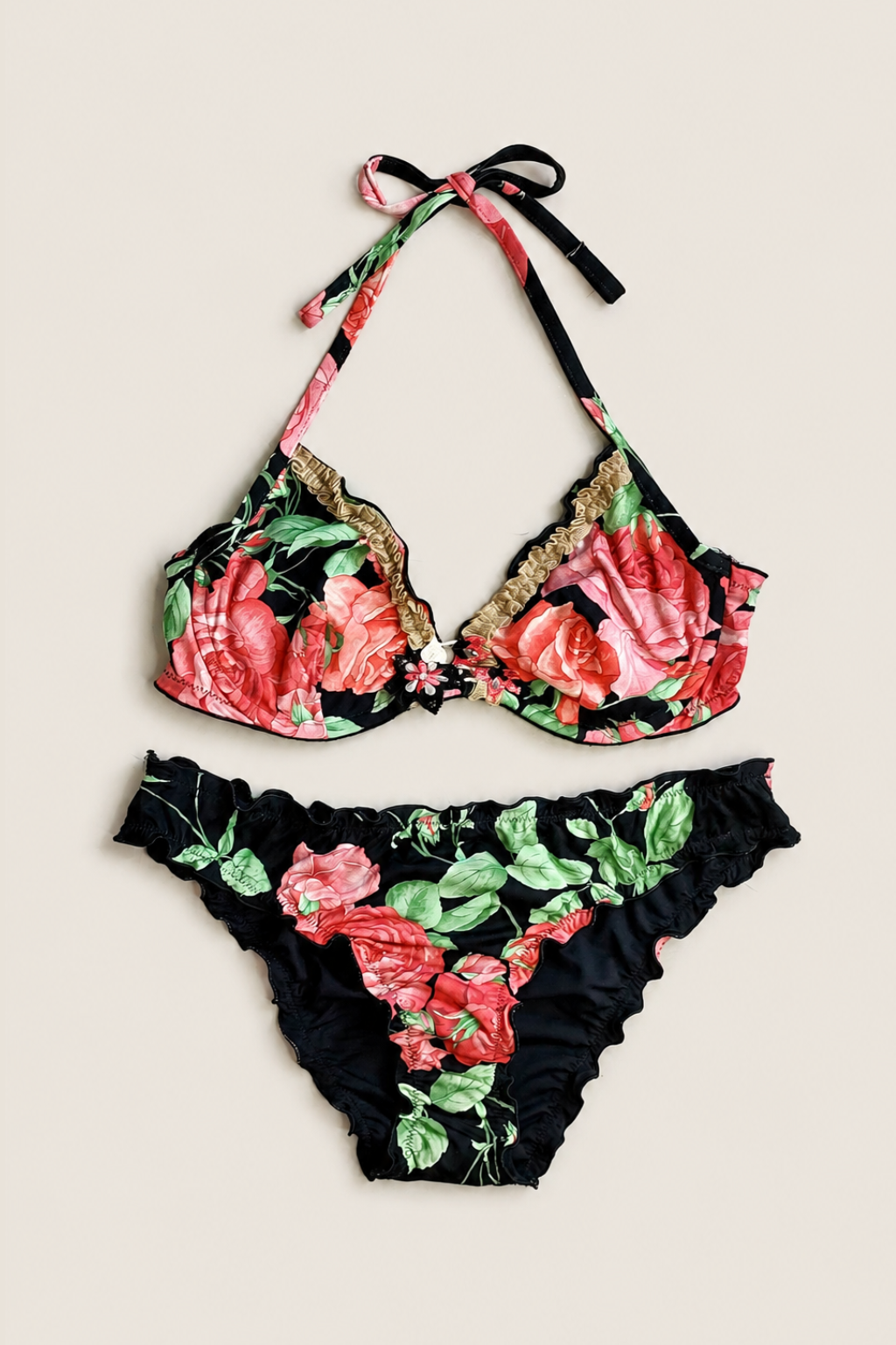 Bikini Raffaela D'Angelo Floral con estampado colorido y diseño bandeau que aporta un estilo fresco y femenino para verano