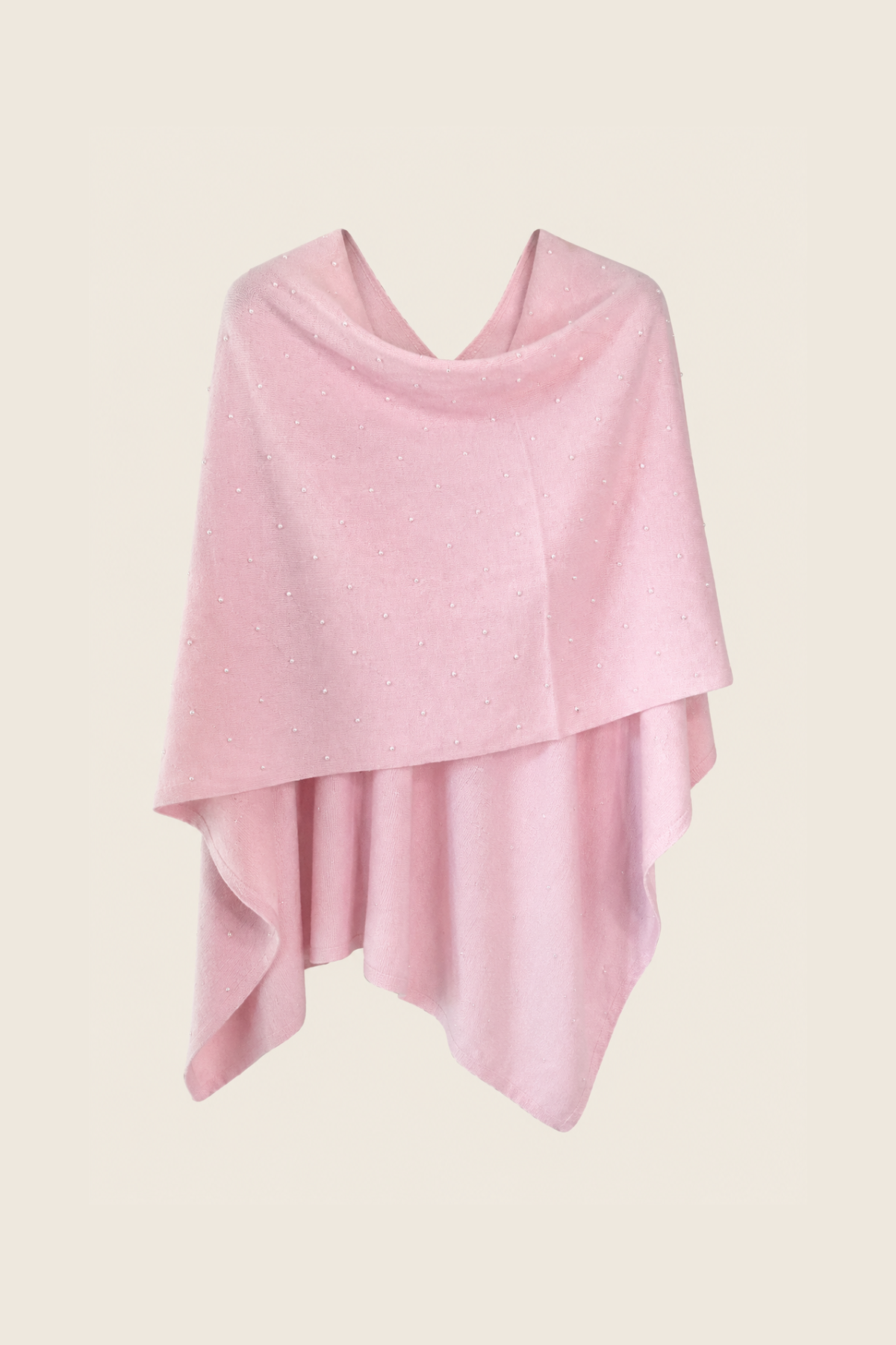Poncho de cashmere rosa In Cashmere con perlas decorativas, ideal para añadir sofisticación y calidez a looks invernales