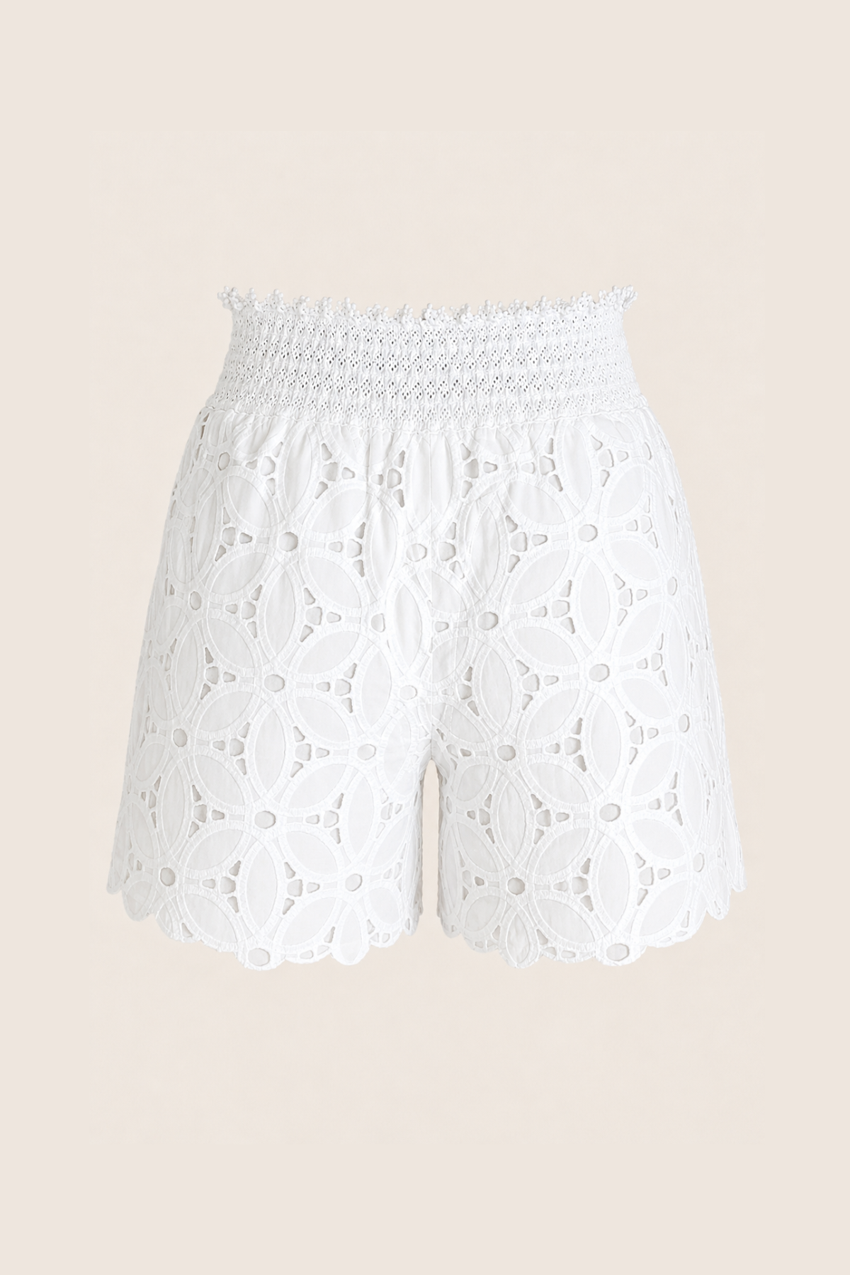 Vista trasera de los shorts Positano Kenya bordados en blanco, mostrando el diseño delicado y la elasticidad de la cintura