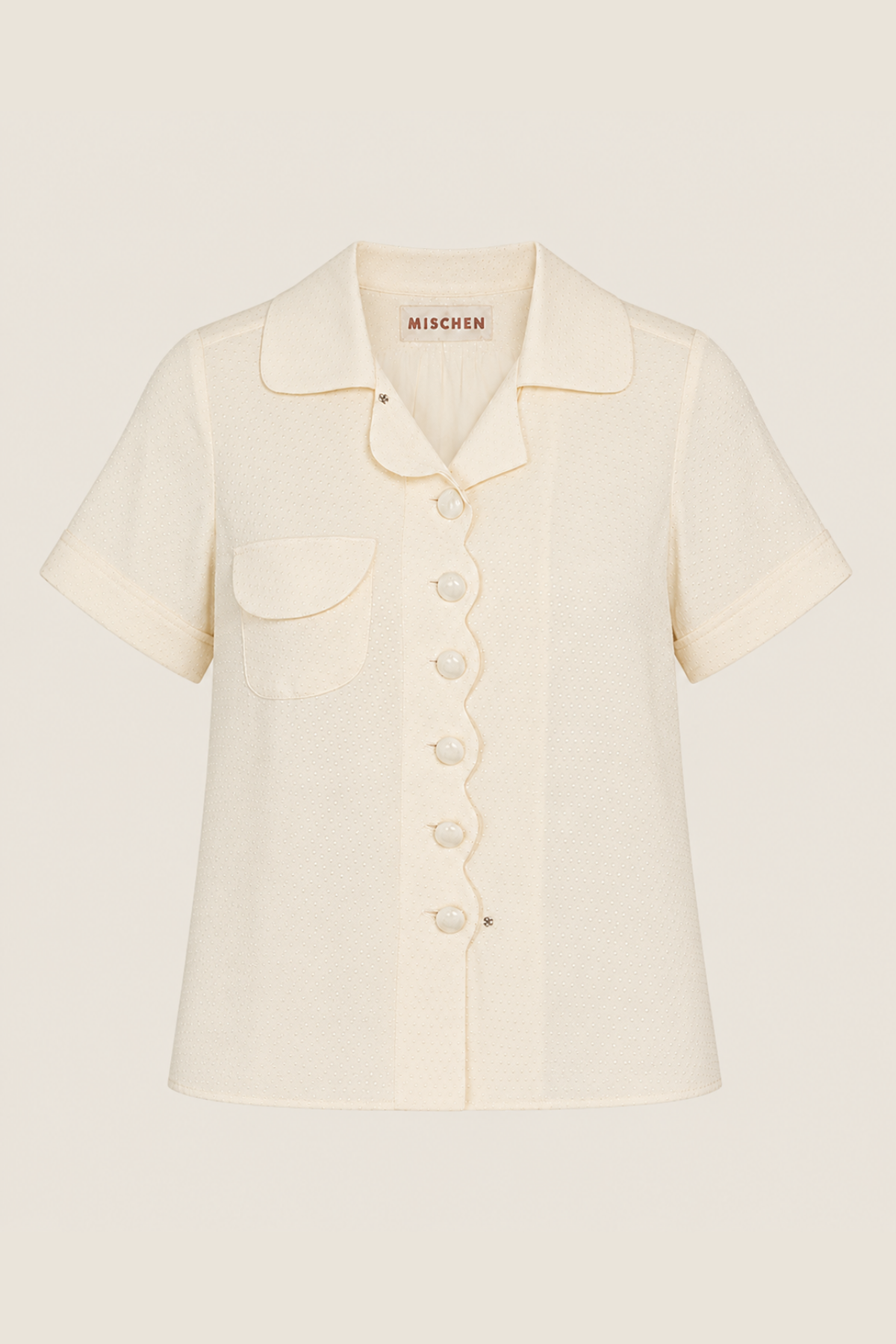 Blusa Mischen en color beige con detalles delicados y elegante caída, perfecta para looks sofisticados y combinaciones versátiles