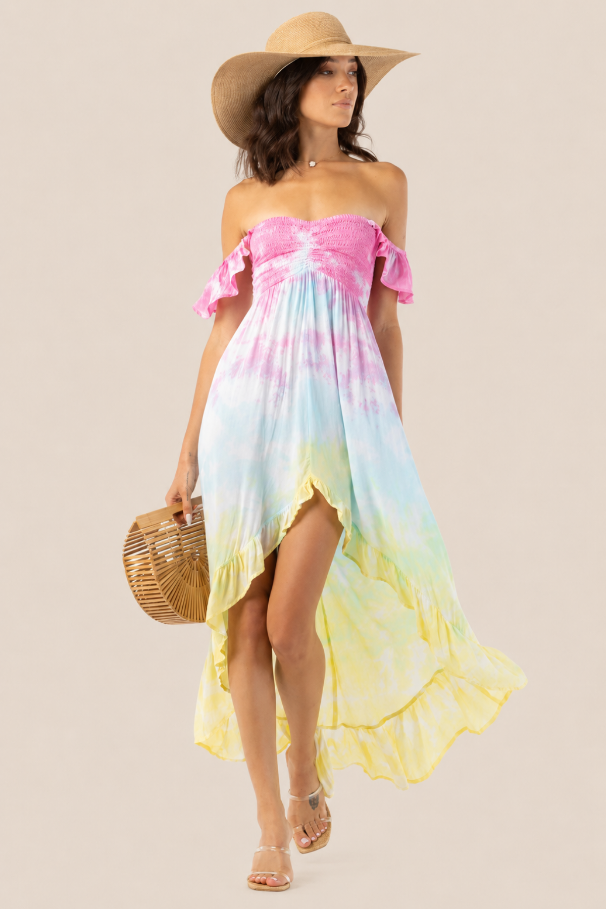 Vestido maxi Tiare Hawaii Brooklyn en estampado rosa, aqua y amarillo con diseño fluido ideal para eventos de verano y playa