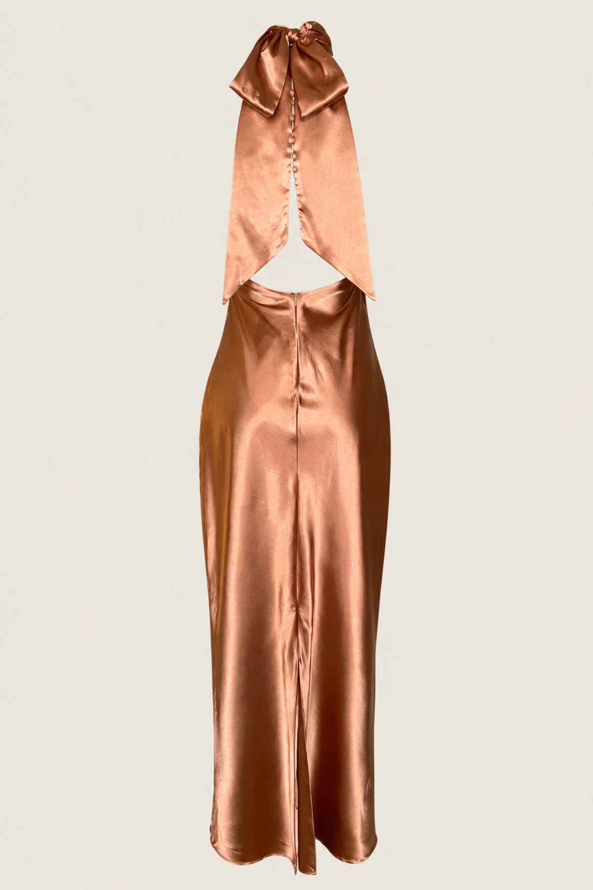 Vista trasera del vestido atado con un lazo en el cuello perfecto para lucir en fiestas y boads