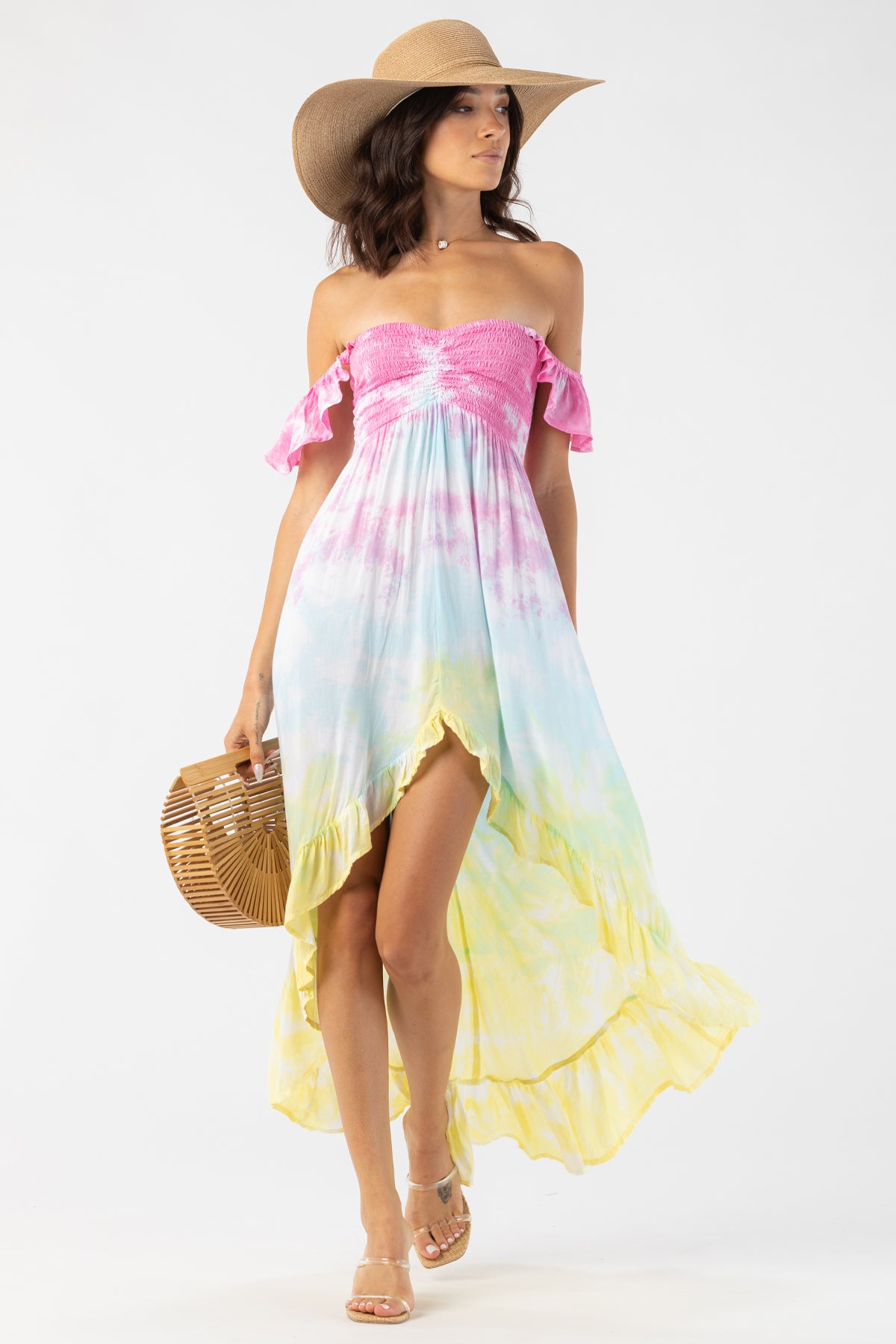 Vestido maxi Tiare Hawaii Brooklyn en estampado rosa, aqua y amarillo con diseño fluido ideal para eventos de verano y playa