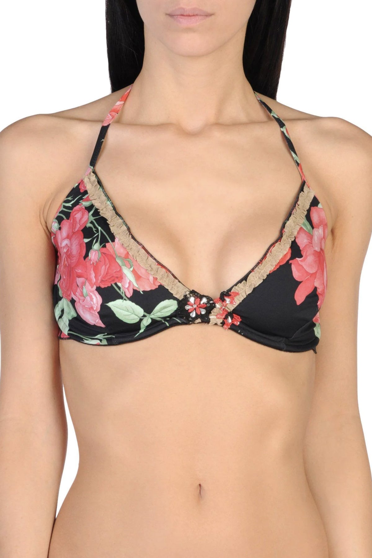 Primer plano de la parte superior del bikini Raffaela D'Angelo Floral, destacando el estampado vibrante y los detalles del tejido