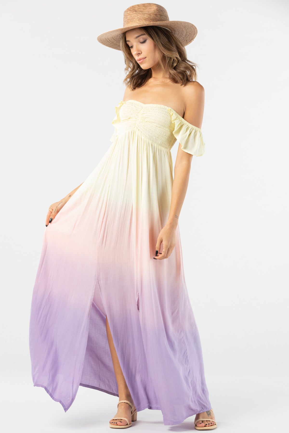 Detalle tejido degradado pastel vestido Hollie maxi con tonos amarillo melocotón y lavanda textura ligera