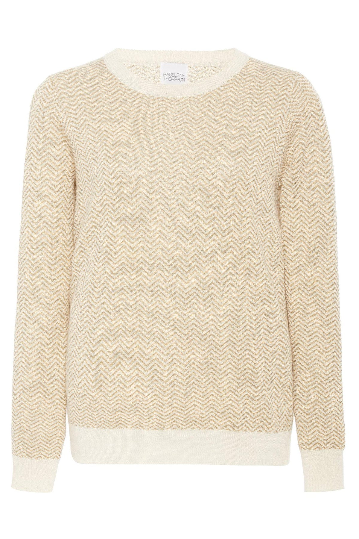 Jersey Goldspur sobre fondo blanco, mostrando el diseño chevron intarsia y la textura delicada del cashmere combinado con seda