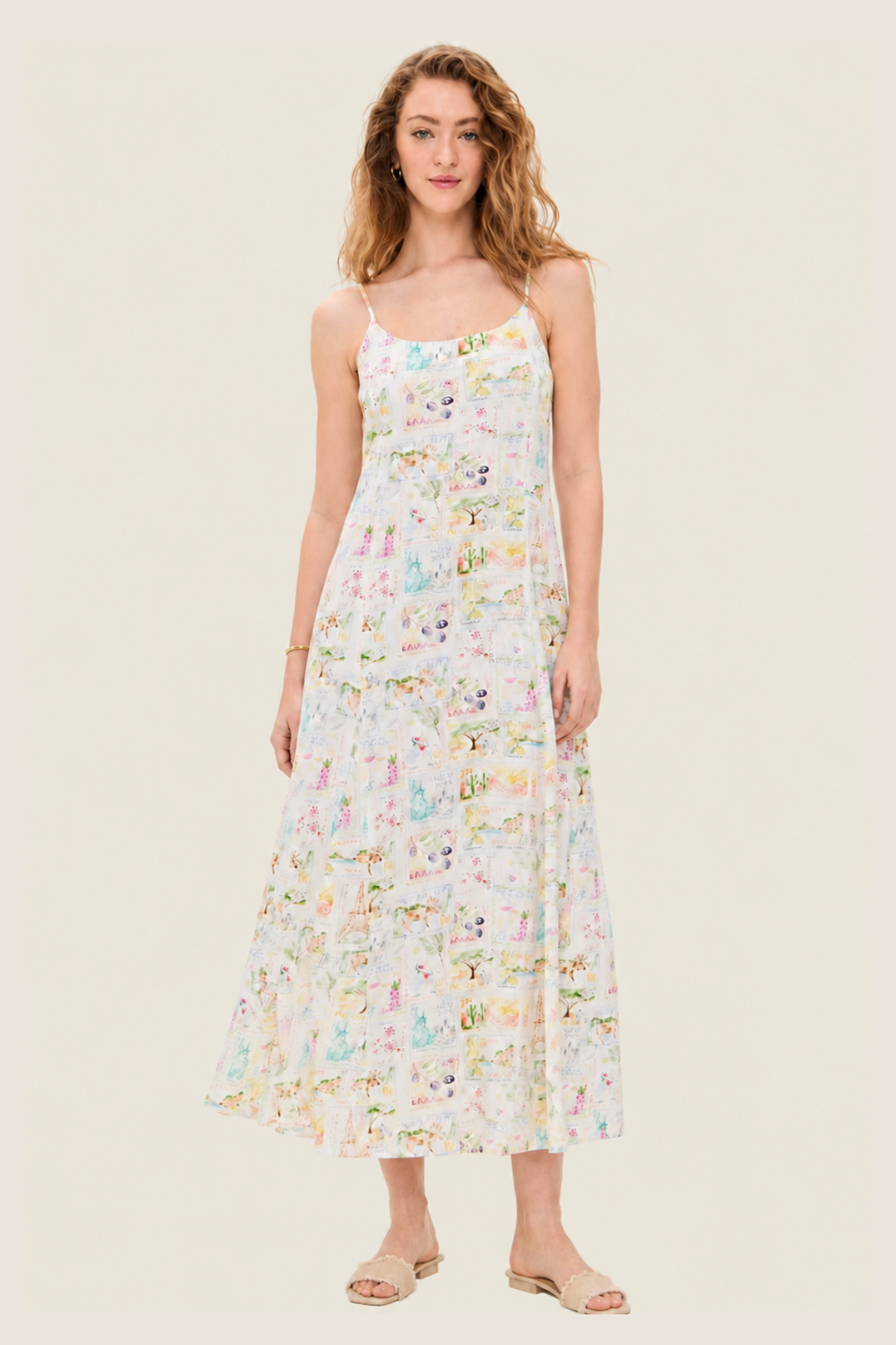 Vestido largo Coastal Postcard en tejido ligero con estampado acuarela azul, escote halter y drapeado asimétrico para looks playeros elegantes