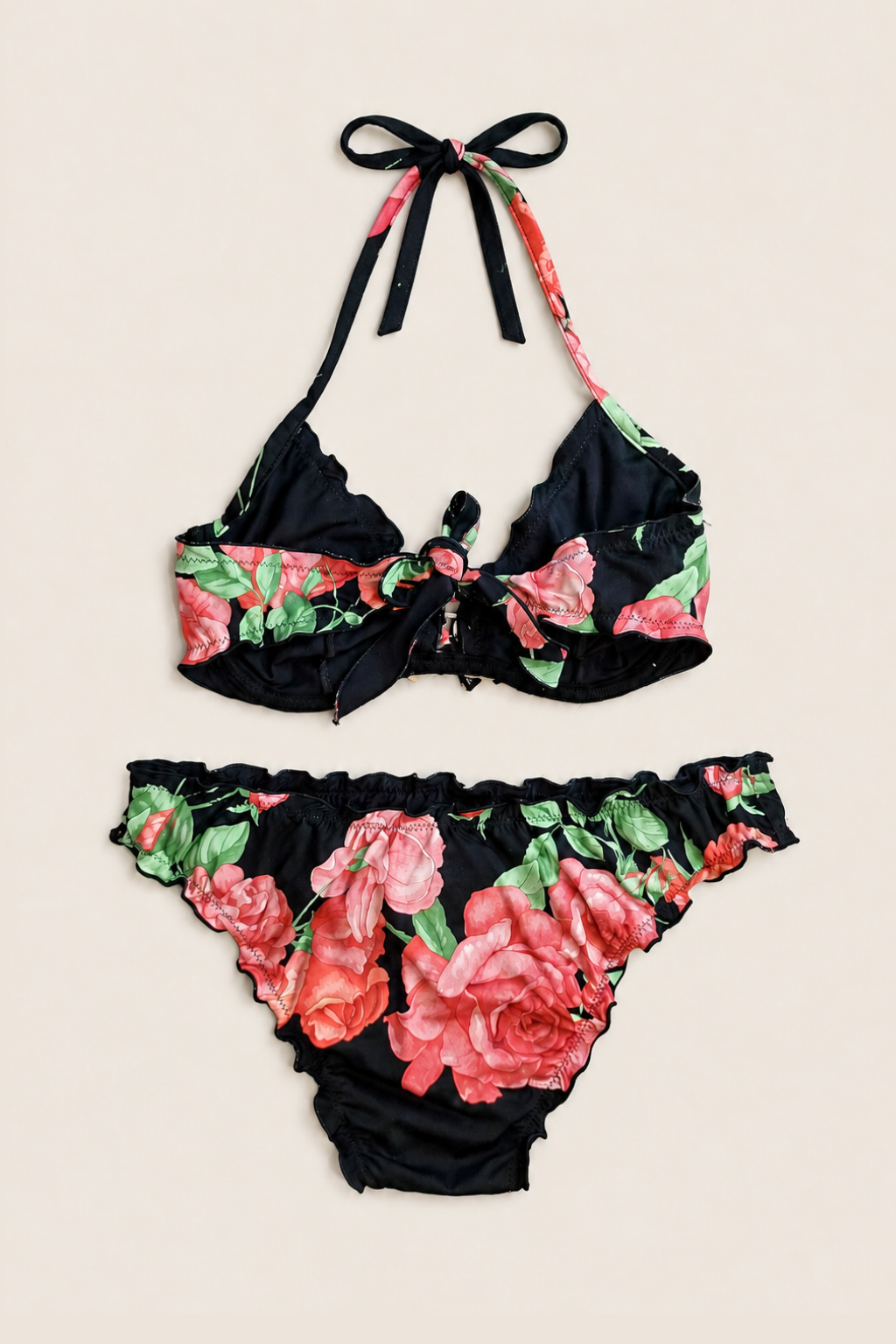 Bikini Raffaela D'Angelo Floral visto de espaldas, con tirantes ajustables y diseño que realza la figura femenina de manera natural