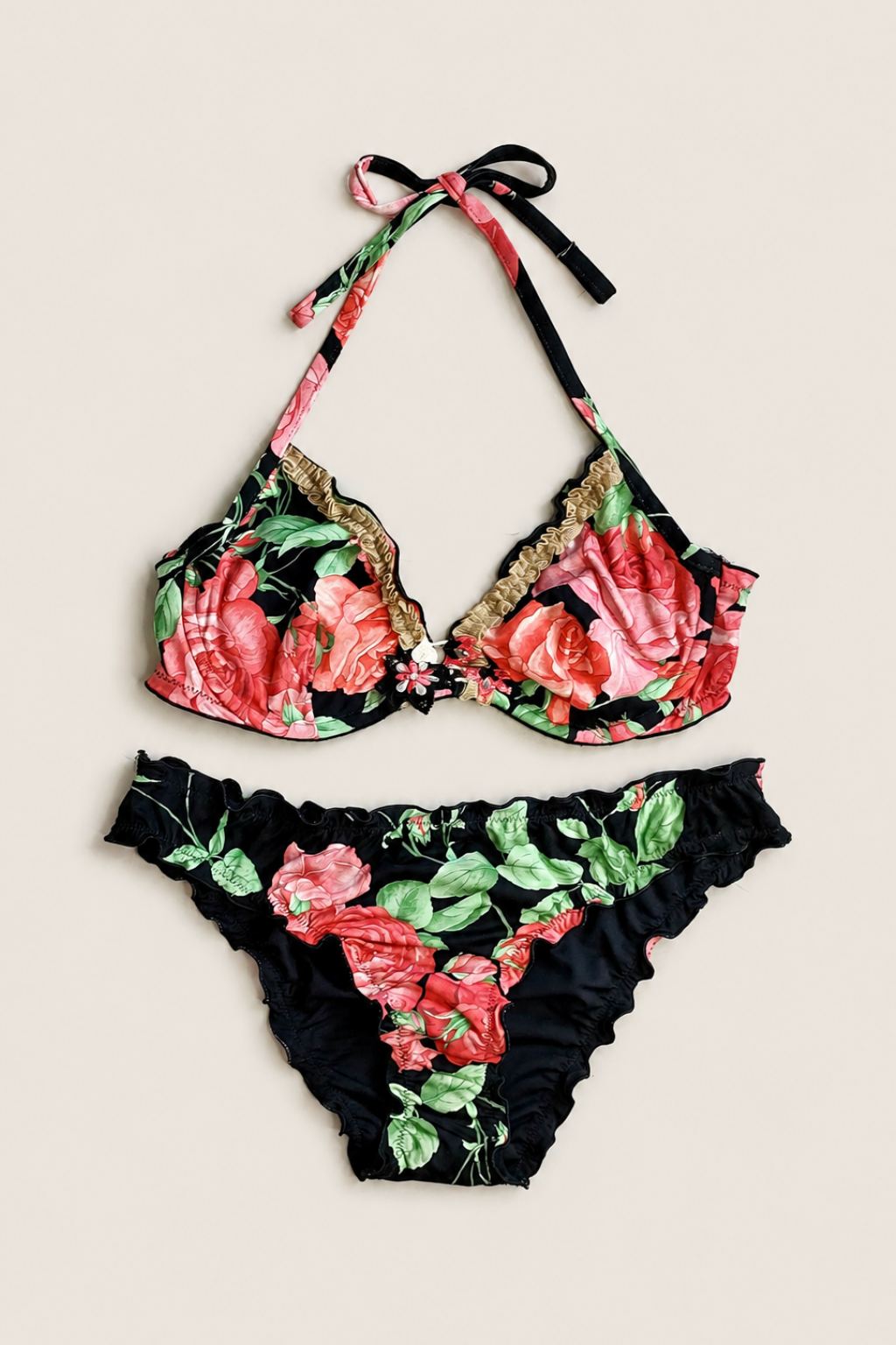 Bikini Raffaela D'Angelo Floral con estampado colorido y diseño bandeau que aporta un estilo fresco y femenino para verano
